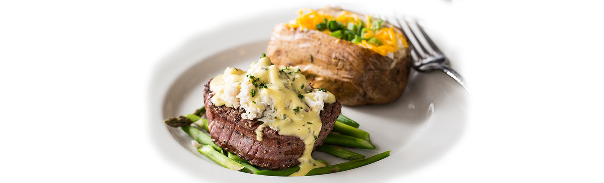 Steak with Crab and Baked Potato